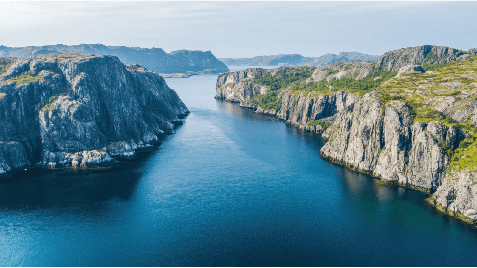 Traveler overlooking Scandinavian fjords — mindful and sustainable travel 2025