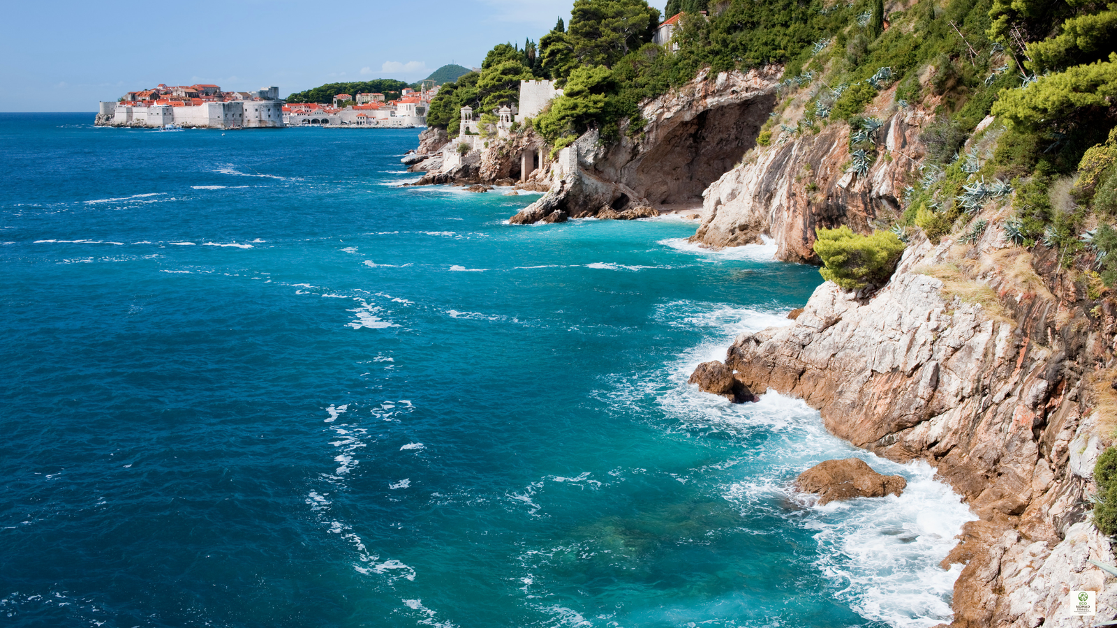 Rocky Adriatic coastline with rugged cliffs and clear blue water