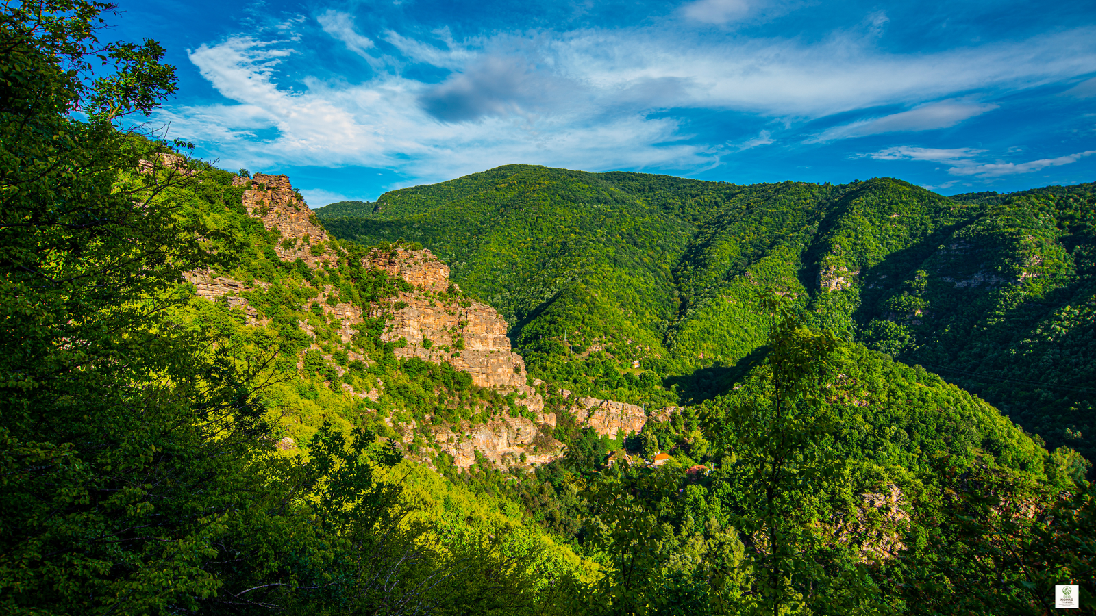 High mountain view in the Balkan Mountains overlooking a valley and small villages