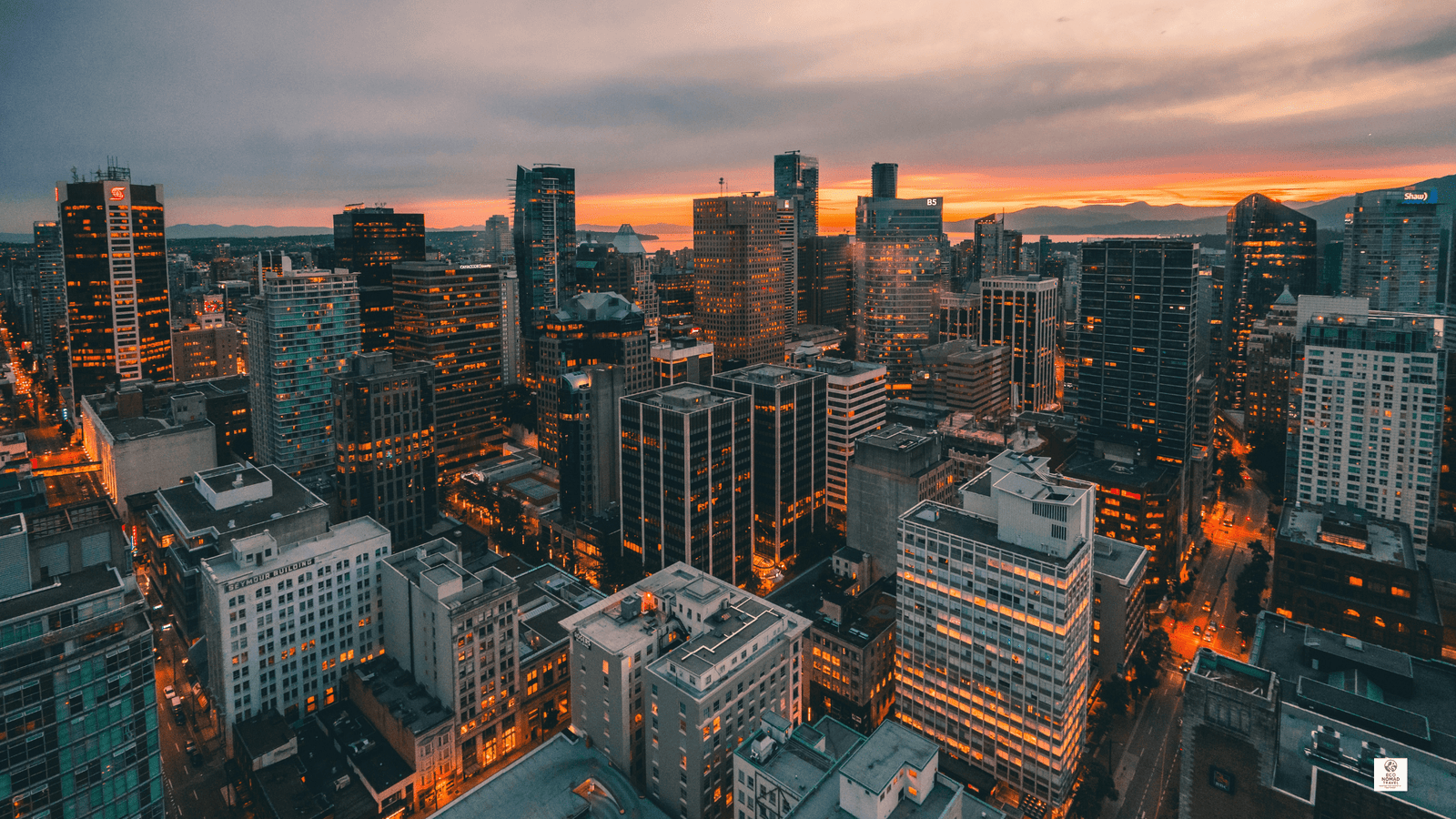 Vancouver, Canada (BC) skyline with mountains in the background – Eco Nomad Travel