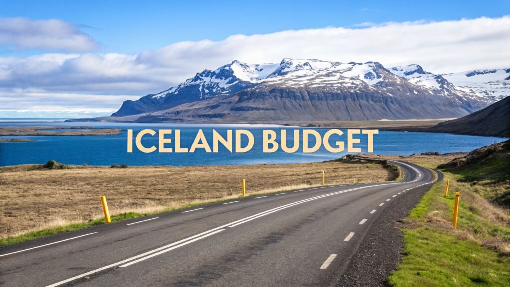 Scenic coastal road and snow-capped mountains in Iceland, illustrating the cost of trip to Iceland planning and budget travel routes.