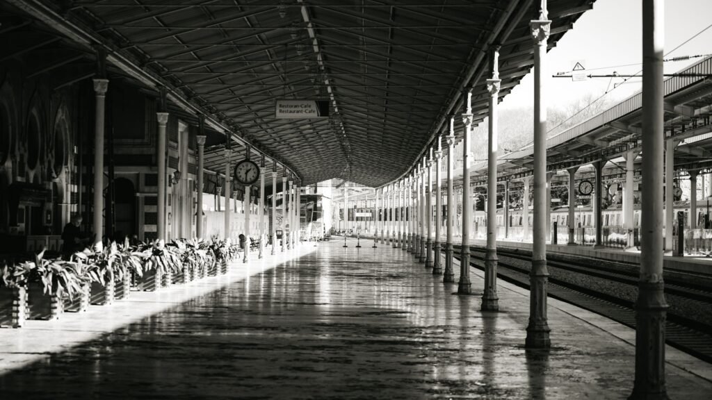 Black and white view of historic Sirkeci train station platform in Istanbul. Photo via Pexels.