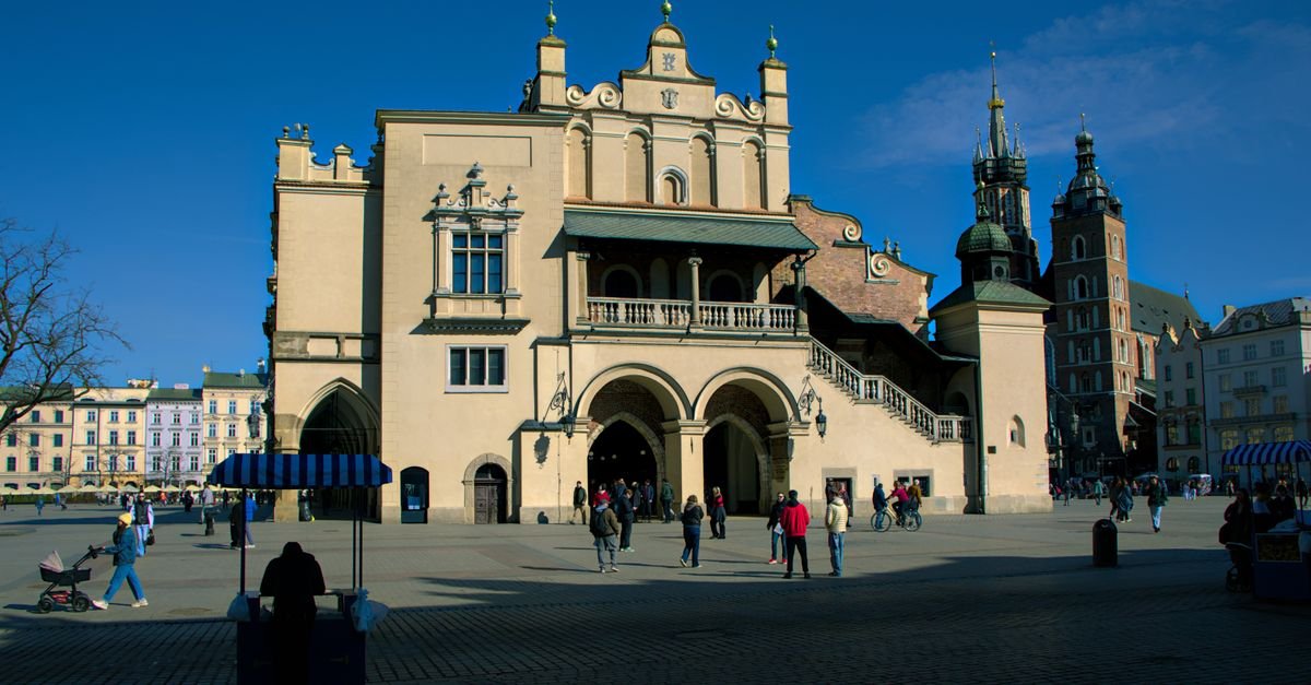 A large market square ringed by historic buildings